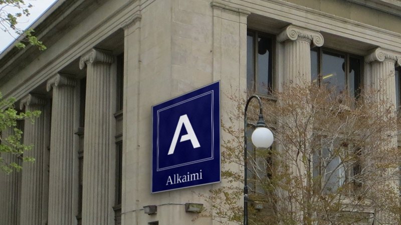 The Alkaimi sign on a bank building.
