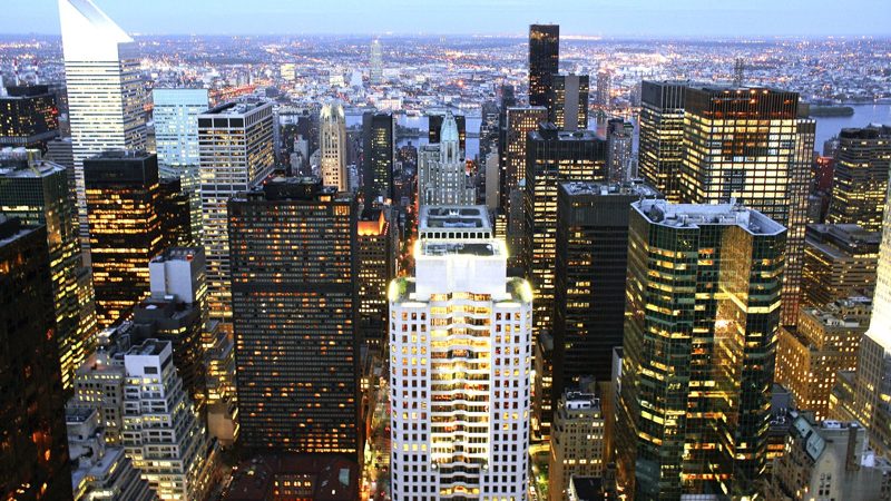 A financial district at night.